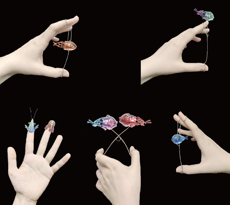 1602159078806410.jpg Fish inbetween fingers 指间鱼趣.jpg